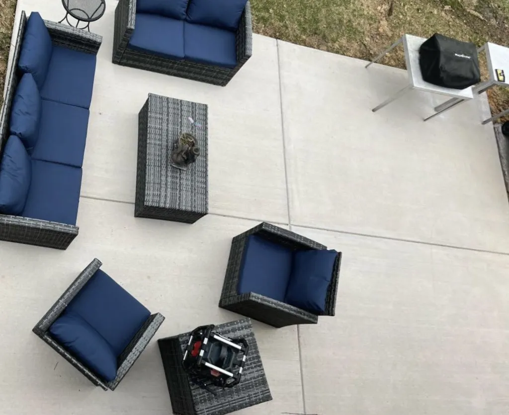 Concrete patio arranged with outdoor seating