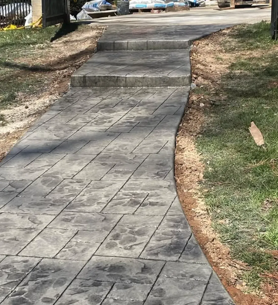 Stamped concrete walkway with steps